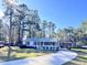 Charming ranch home with a metal roof, carport, and spacious front porch at 202 Briarwood St, Walterboro, SC 29488