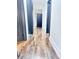 View down a long hallway showcasing wood-look floors and interior doors at 202 Briarwood St, Walterboro, SC 29488