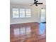 Living room featuring hardwood floors and lots of natural light at 202 Briarwood St, Walterboro, SC 29488