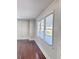 Bright living room with hardwood floors and windows at 202 Briarwood St, Walterboro, SC 29488