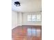 Bright living room with hardwood floors and large windows at 202 Briarwood St, Walterboro, SC 29488