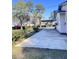 Side yard with long concrete patio at 202 Briarwood St, Walterboro, SC 29488