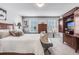 Main bedroom with large bed, dresser, and built-in entertainment center at 240 Godwit Dr, Summerville, SC 29486