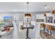 Elegant dining area with a round table and four chairs, adjacent to the kitchen at 240 Godwit Dr, Summerville, SC 29486