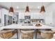 Modern kitchen with white cabinets, stainless steel appliances, and a large island at 240 Godwit Dr, Summerville, SC 29486