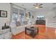 Living room with hardwood floors, comfortable seating and a large TV at 2469 Kings Gate Ln, Mount Pleasant, SC 29466