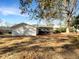 Large backyard with mature trees and open space at 3 Tommy Cir, Goose Creek, SC 29445