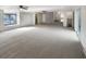Expansive Gathering room with carpeting, high ceilings, and lots of natural light at 3 Tommy Cir, Goose Creek, SC 29445