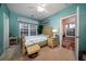 Bedroom with a queen bed, built in shelving, and access to a second bathroom at 3001 Parkwest Boulevard, Mount Pleasant, SC 29466