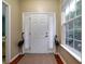 Bright entryway with white door, large window, and decorative bird statues at 3001 Parkwest Boulevard, Mount Pleasant, SC 29466