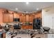 Kitchen with granite countertops, wooden cabinets, and a breakfast bar at 3001 Parkwest Boulevard, Mount Pleasant, SC 29466