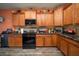 Modern kitchen featuring wood cabinets and granite countertops at 3001 Parkwest Boulevard, Mount Pleasant, SC 29466