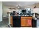 Kitchen island with granite countertops and black appliances at 3001 Parkwest Boulevard, Mount Pleasant, SC 29466