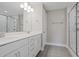 Contemporary bathroom with double vanity, large mirror, and tiled glass enclosed shower at 351 Wappoo Trace Ln, Summerville, SC 29486