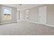 Bright, carpeted room with multiple windows, offering ample natural light and a serene atmosphere at 351 Wappoo Trace Ln, Summerville, SC 29486