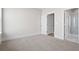 Neutral bedroom featuring carpet, white trim and doors, and an en suite bathroom at 351 Wappoo Trace Ln, Summerville, SC 29486