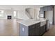 Spacious open concept kitchen with a large island, stainless steel appliances, and hardwood floors at 351 Wappoo Trace Ln, Summerville, SC 29486