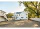 The back of the home features a screened-in porch, backyard, and an exterior staircase at 362 6Th Ave, Mount Pleasant, SC 29464