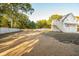 Large backyard with detached garage and unfinished landscaping at 362 6Th Ave, Mount Pleasant, SC 29464