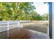 Spacious backyard with a large grassy area and wooden fence at 362 6Th Ave, Mount Pleasant, SC 29464