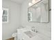 Bathroom featuring white vanity with marble countertop, and large mirror at 362 6Th Ave, Mount Pleasant, SC 29464