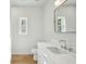 Bathroom featuring white vanity with marble countertop, and large mirror at 362 6Th Ave, Mount Pleasant, SC 29464