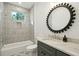 Modern bathroom with a stylish vanity and a bathtub at 362 6Th Ave, Mount Pleasant, SC 29464