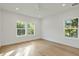 Spacious bedroom with hardwood floors and large windows at 362 6Th Ave, Mount Pleasant, SC 29464