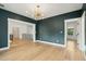 Large bonus room with hardwood floors and access to hallway at 362 6Th Ave, Mount Pleasant, SC 29464