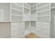 Bright walk-in closet featuring custom shelving and drawers for optimal storage at 362 6Th Ave, Mount Pleasant, SC 29464