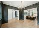 Open dining room with hardwood floors and chandelier at 362 6Th Ave, Mount Pleasant, SC 29464