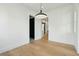Bright dining room features hardwood floors and modern light fixture at 362 6Th Ave, Mount Pleasant, SC 29464