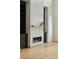 Modern linear fireplace with a concrete surround and built-in shelves at 362 6Th Ave, Mount Pleasant, SC 29464
