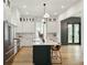 Modern kitchen with stainless steel appliances and a large island at 362 6Th Ave, Mount Pleasant, SC 29464