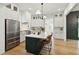 Modern kitchen with stainless steel appliances and a large island at 362 6Th Ave, Mount Pleasant, SC 29464