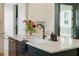 Kitchen island with marble countertop, sink, and modern faucet at 362 6Th Ave, Mount Pleasant, SC 29464