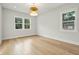 Light-filled office featuring hardwood floors and two windows at 362 6Th Ave, Mount Pleasant, SC 29464
