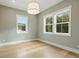 Spacious office with hardwood floors and multiple windows at 362 6Th Ave, Mount Pleasant, SC 29464