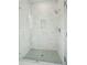 Modern shower featuring a stone floor and tiled walls with inset at 362 6Th Ave, Mount Pleasant, SC 29464
