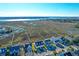 Aerial view of a waterfront home with private dock and marsh views at 363 Clayton Dr, Charleston, SC 29414