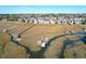 Aerial view of waterfront community with private docks and marsh views at 363 Clayton Dr, Charleston, SC 29414