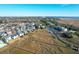 Aerial view of a waterfront property with private dock and boat lift at 363 Clayton Dr, Charleston, SC 29414