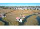 Aerial view of waterfront property with private docks and marsh views at 363 Clayton Dr, Charleston, SC 29414
