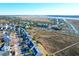 Aerial showing waterfront community, homes with marsh views and private docks at 363 Clayton Dr, Charleston, SC 29414