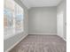Well-lit bedroom featuring carpet, large window and closet at 363 Clayton Dr, Charleston, SC 29414