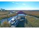 Waterfront dock with gazebo and boat, marsh views at 363 Clayton Dr, Charleston, SC 29414