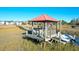 Private boat dock with gazebo and marshland views at 363 Clayton Dr, Charleston, SC 29414