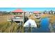 Private boat dock with two gazebos and a boat at 363 Clayton Dr, Charleston, SC 29414