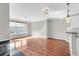 Open concept dining room with hardwood floors and kitchen access at 363 Clayton Dr, Charleston, SC 29414