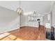 Bright dining room with hardwood floors and a view of the kitchen and living room at 363 Clayton Dr, Charleston, SC 29414